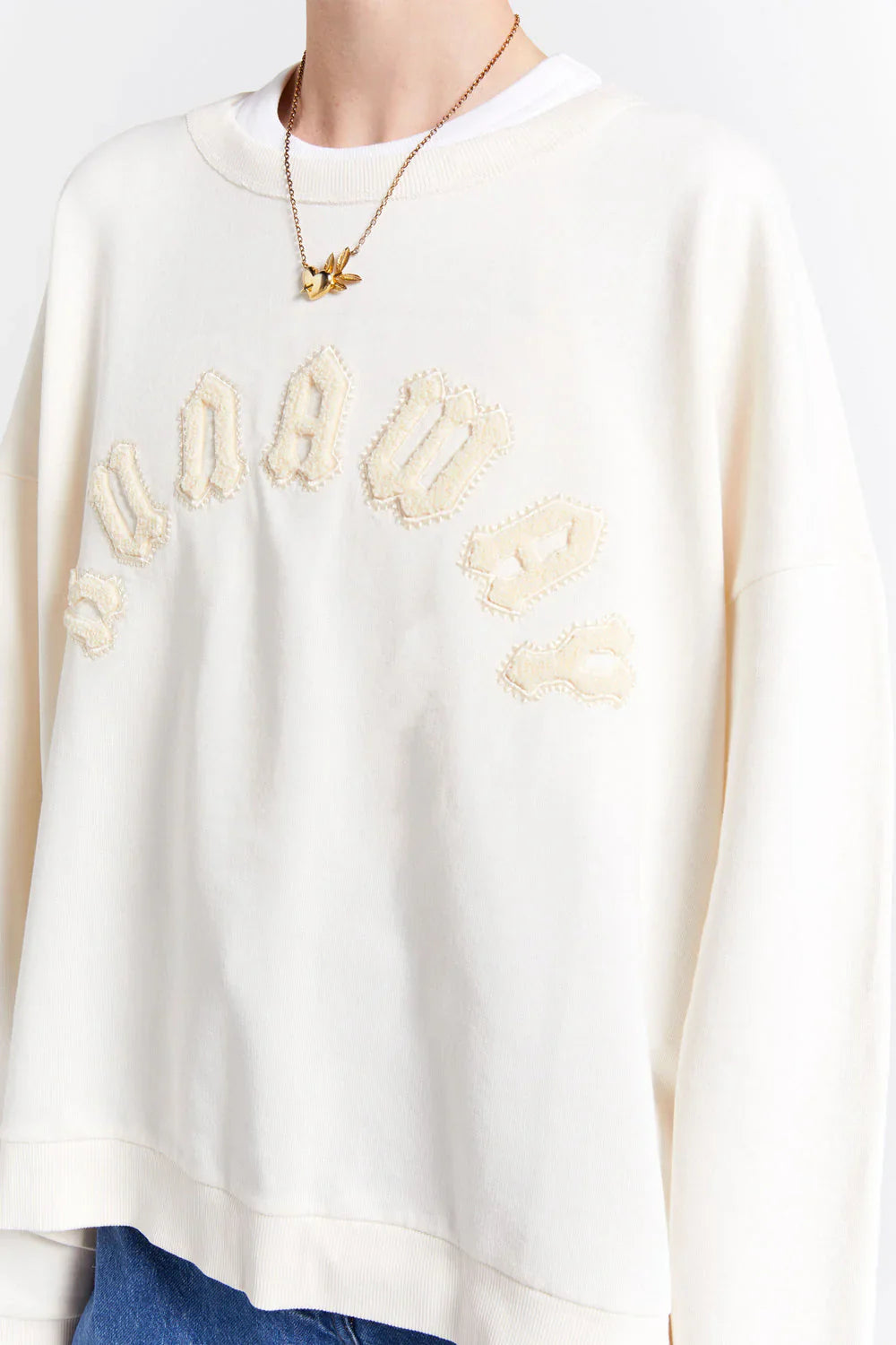 KAREN WALKER // Runaway Arch Organic Cotton Sweatshirt ECRU
